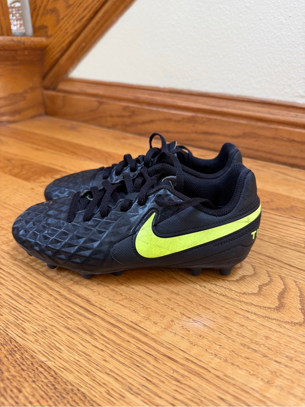 Nike Kids Black Soccer Cleats with Neon Yellow Swoosh